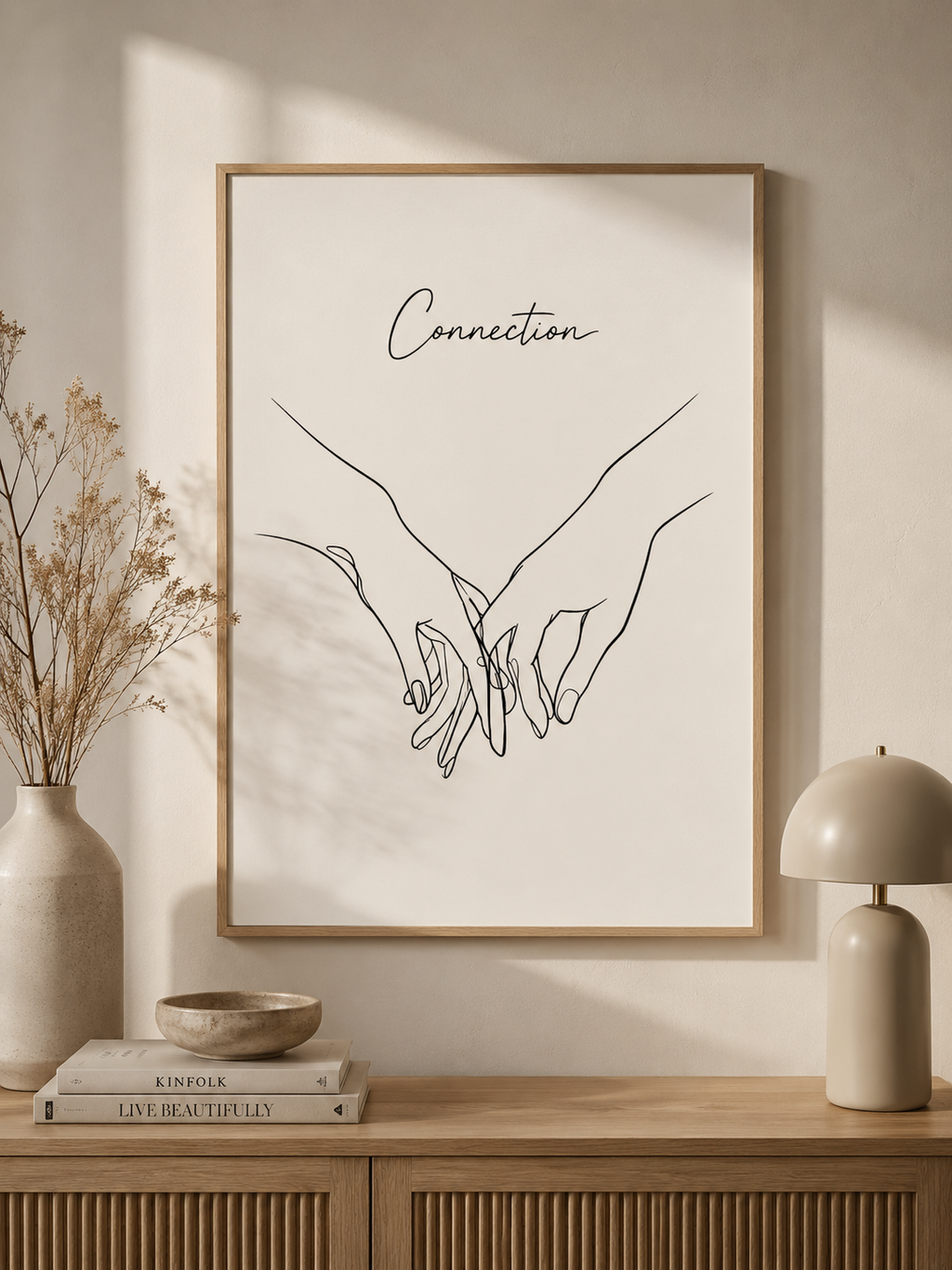 Connection minimal line art print — framed wall art mockup with a couple in an intimate minimal line art embrace, displayed in a warm neutral interior, Morphē Studio