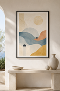 Mediterranean Drift | Printable Abstract Wall Art | Morphē Studio — framed dreamy Mediterranean abstract print in black frame on white wall above stone console with ceramic bowl and vase beside arched window with olive tree view
