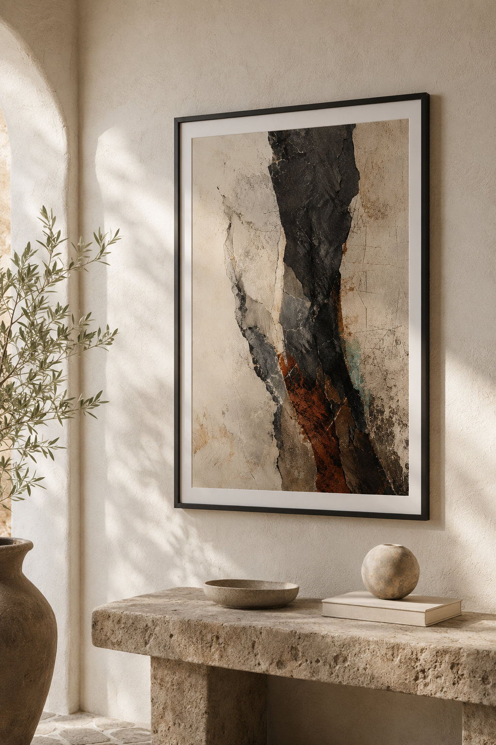 Tectonic Silence | Printable Abstract Wall Art | Morphē Studio — framed dark stone texture print on warm plaster wall above travertine console with ceramic objects